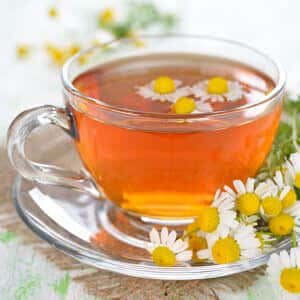 Chamomile tea in a glass cup